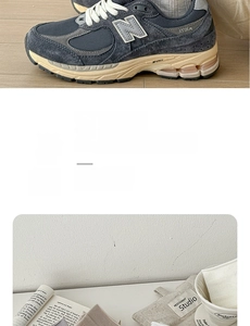 Macro detail of the New Balance 2002R sneaker showing mesh upper and NERGY midsole