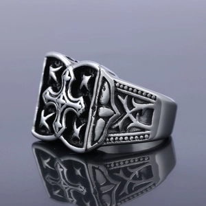 Vintage stainless steel cross star ring for men with antique silver finish on black mirror