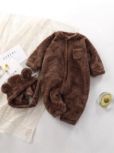 Plush brown baby romper with bear ear hood on warm fleece fabric for winter comfort