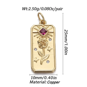 Detailed view of a gold-plated copper pendant featuring a red zircon and rose relief