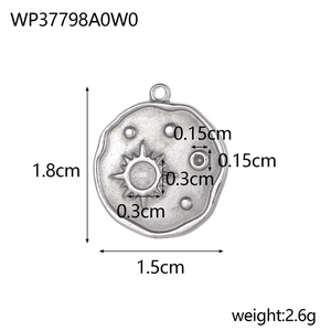 Detailed view of vintage sun pendant with size measurements 1.8cm x 1.5cm