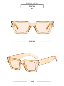 Detail view of tea-colored rectangular sunglasses featuring premium resin frames and C5 lenses