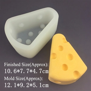 Detailed comparison of cheese-shaped silicone mold and finished yellow cake dessert model