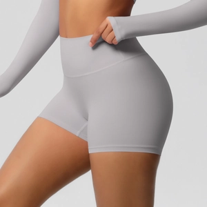 Detail view of high-waisted seamless yoga shorts in light grey brushed matte fabric