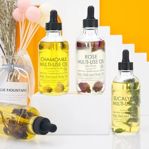Three 120ml dried flower oils for hair and body with chamomile, rose and eucalyptus