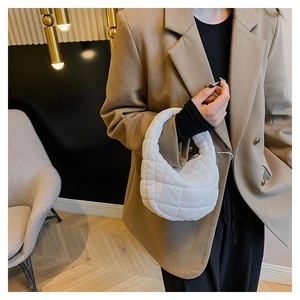 Quilted cloud bag in white nylon with soft padding and premium stitching detail