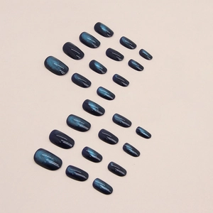 Deep blue cat-eye magnetic oval press-on nails set with 24 pieces in shimmering finish