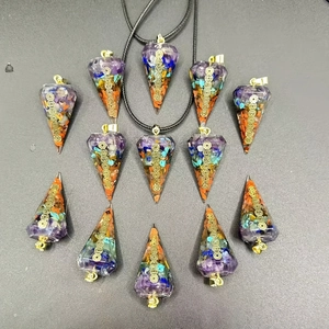 Detailed set of 12 hexagonal chakra resin pendants with natural crushed crystals and gold icons