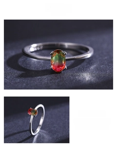 Detailed macro view of an oval gradient tourmaline ring in a 925 sterling silver four-prong setting