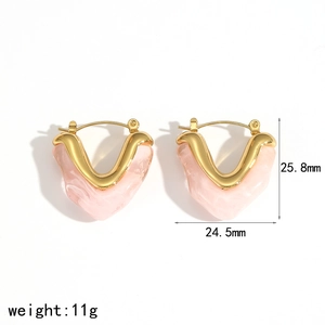 Detailed view of pink resin heart earrings with gold metal frame showing 25.8mm size
