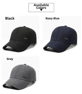 Detailed close-up of baseball caps in black, navy blue and grey with embroidered logo