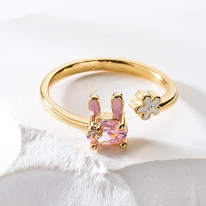 18K gold plated rabbit ring with pink crystal and white enamel flower detail