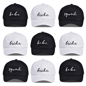 Black and white Squad Bride baseball caps with elegant script embroidery for wedding parties