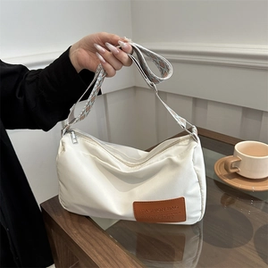 White nylon shoulder bag with geometric wide strap and fashion leather patch label