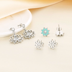 Ensemble de boucles d oreilles lotus vintage en argent avec pétales et zircons bleus
