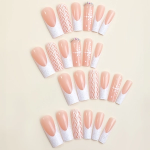 Winter 3XL press-on nails with white French tips, 3D knit texture, and snowflake rhinestones