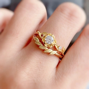 S925 sterling silver gold flower and leaf ring set with white stones on hand