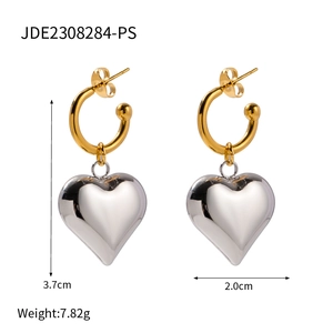 Detailed view of two-tone heart earrings with 3.7cm height and 2.0cm width dimensions