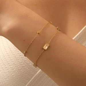 Minimalist double-layered gold-plated stainless steel chain bracelet with zircon stones