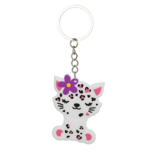 Close-up of leopard cat keychain with floral decor made of soft PVC and metal ring