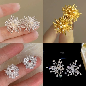 Elegant gold and silver firework stud earrings with sparkling cubic zirconia stones