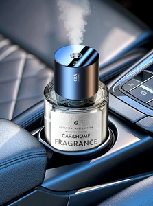 Detailed close-up of smart car fragrance diffuser spraying mist in the vehicle cup holder