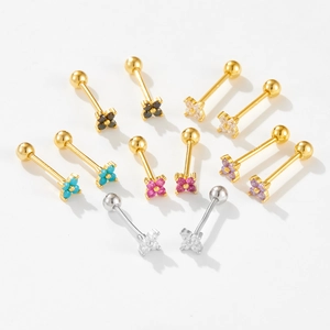Macro detail of S925 sterling silver four-leaf clover stud earrings in multiple colors