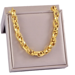Golden chunky stainless steel chain bracelet displayed in a premium grey jewelry gift box