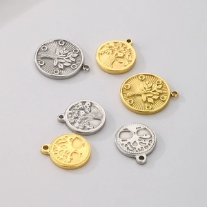 Selection of stainless steel Tree of Life pendants in silver and gold for jewelry making