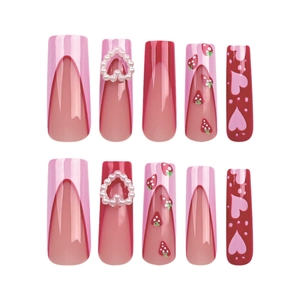 Pink French press-on nails with 3D heart pearls and strawberry prints in long trapezoid shape