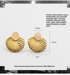 Detail view of gold fan-shaped stud earrings with pink stone inlay and measurements
