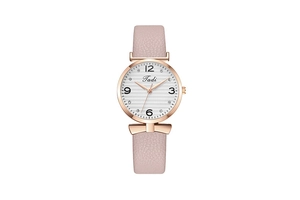 Close-up of pink leather watch with bow-shaped lugs and rose gold textured dial