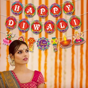 Colorful Happy Diwali banner with paper deity cards and traditional hanging decorations