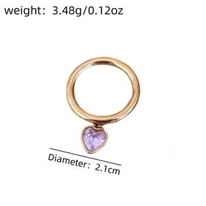 Detail of heart ring with purple zircon including weight 3.48g and 2.1cm diameter specs