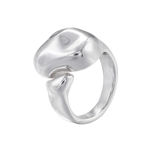 Macro detail of silver geometric irregular twisted ring with polished metallic finish