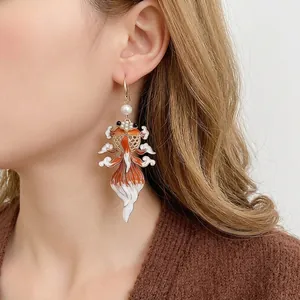 Elegant goldfish pearl drop earrings in retro style featuring red white enamel details