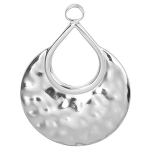 Macro detail of teardrop-shaped silver stainless steel pendant with hammered metal texture