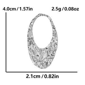 Irregular oval stainless steel pendant with ghost face texture and size measurements