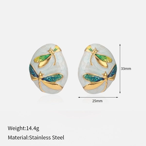 Detailed view of dragonfly oval earrings with enamel wings and size measurements