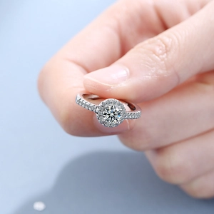 Elegant silver wide band ring with round center cubic zirconia and pavé side diamonds