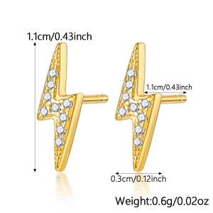 Detailed view of gold plated lightning bolt stud earrings with clear pave set crystals