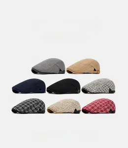 Detail view of knitted beret hats showing 8 colors including tweed and metal side buckles