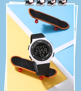 Detail view of digital sports watch with white case, black strap, and 5 ATM waterproof mark