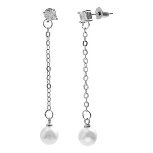 Detail of silver drop earrings with square zircon and white pearl hanging on long chain