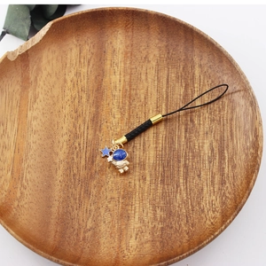 Cosmic astronaut star phone charm cute bag pendant metal accessory for daily use.