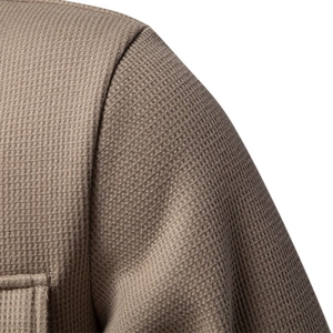 Brown waffle knit cardigan jacket for men featuring shoulder seam detail and thick fabric