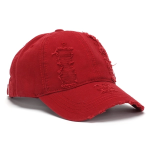 Red distressed vintage baseball cap with ripped details and adjustable back strap