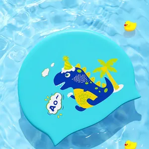 Blue silicone swimming cap for kids with cute cartoon dinosaur and waterproof design