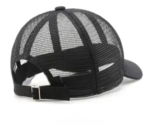 Detail view of the breathable mesh back and adjustable metal buckle of a black baseball cap