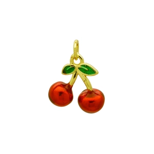 Detail of red cherry pendant with golden stems and green enamel leaf on white background